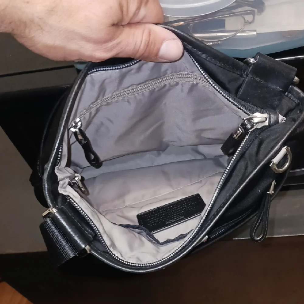 Tumi Black Messenger Bag with Adjustable Strap